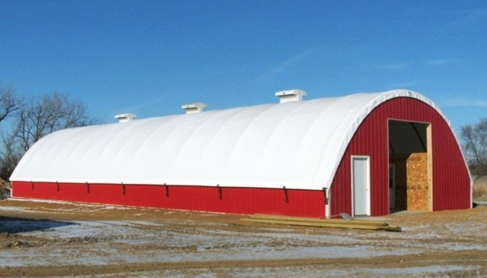 Furnish and install fabric building - hoop barn construction